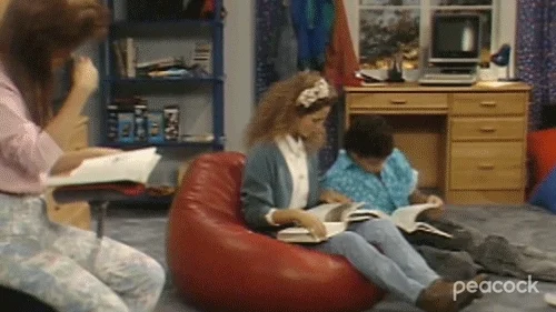 A group of Saved By the Bell students studying together. 