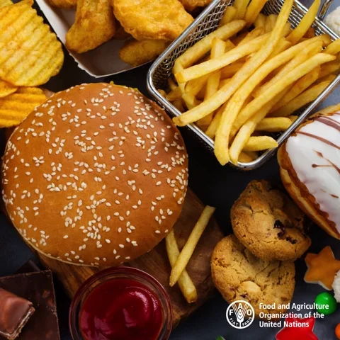 A graphic showing a hamburger, fries, and other unhealthy foods. A screen wipe reveals fresh fish and vegetables.