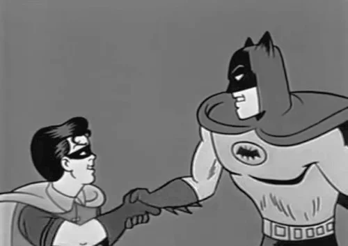 A black and white GIF showing Batman and Robin shaking hands.