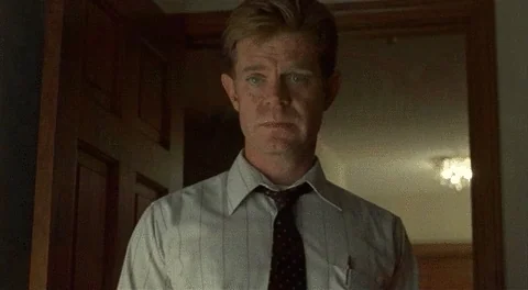A man says, "That's the best we can do here", before closing a door behind him. 