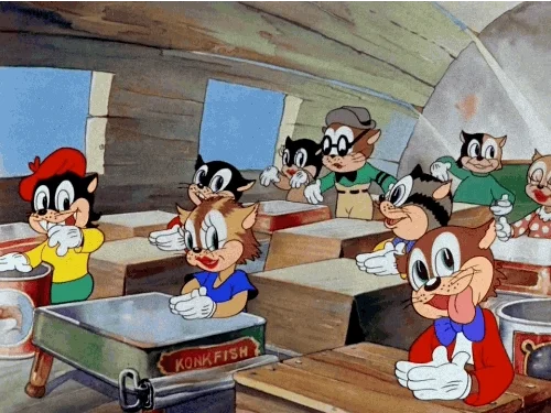 Cartoon cats as students all clapping and smiling in the classroom.