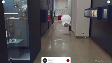 Virtual tour of a medical museum with a floating robot host.
