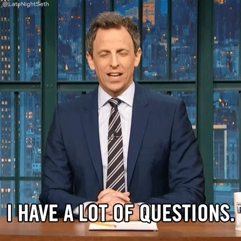 Seth Meyers speaking from his desk, with onscreen text reading: "I have a lot of questions."