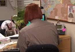 A video montage of the character Dwight from The Office in a series of ugly wigs that do nothing to conceal his identity.