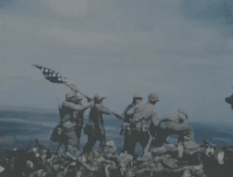 Footage of US Marines hosting the American Flag at Iwo Jima.