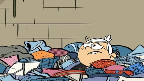 animated character with an exasperated expression swimming in a massive pile of laundry