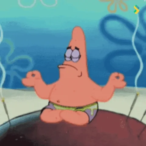 Patrick star sitting on his rock house with his legs crossed mediating. 