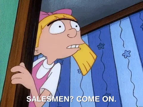 Cartoon girl, Helga peers around the corner mouth open, overlaid text reads 'salesmen? come on.'