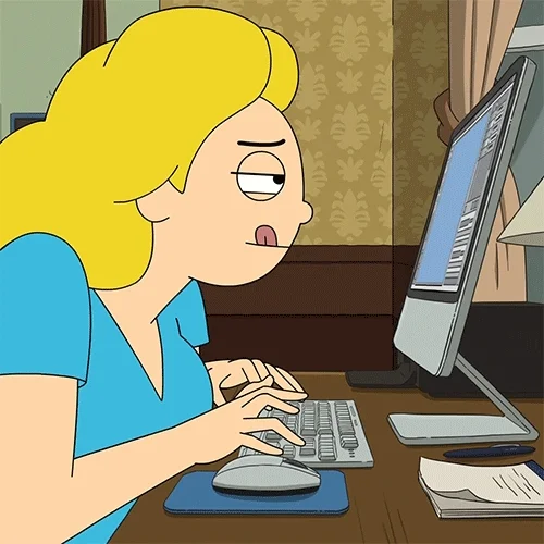 A female cartoon character wearing a blue top and has yellow blonde hair, furiously typing at a computer.