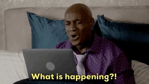 Confused and irritated man looking at the laptop, saying,