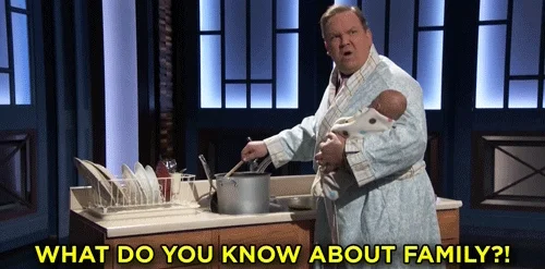 A man stirring a pot with a spoon while holding. He says, 