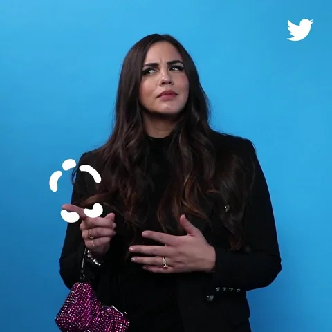 A woman thinking about different questions.
