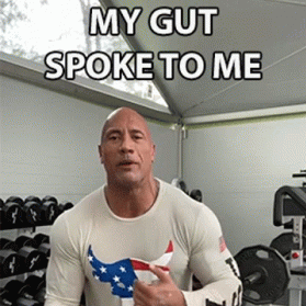 Dwayne 'The Rock' Johnson pointing to himself as he speaks. Overlaid text reads, 'My gut spoke to me.' 
