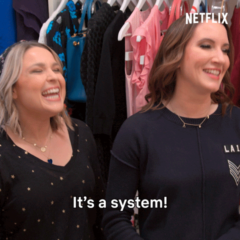 Women enthusiastically saying 'It's a system!'