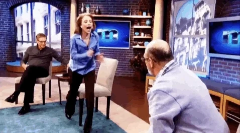 A couple arguing with each other as they are guests on The Maury Povich Show.