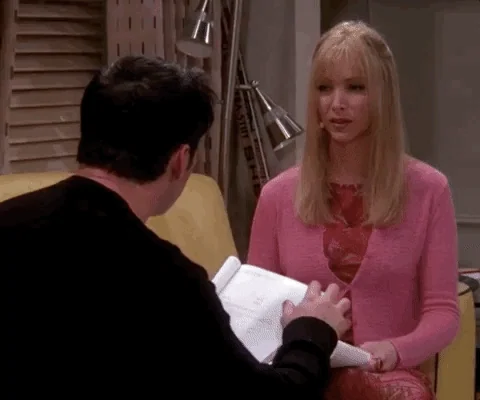 Phoebe sits across from Joey in a mock interview on Friends,. She confidently says, 