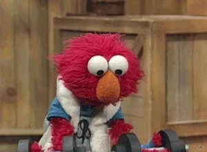 Elmo lifting weights