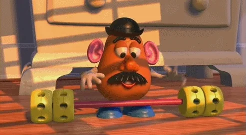 Mr. Potato hHead trying to lift a barbell and breaking his arms.