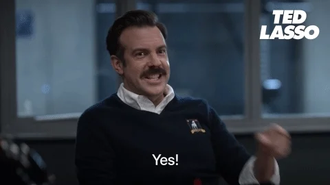 Ted Lasso pointing at the camera and saying, 