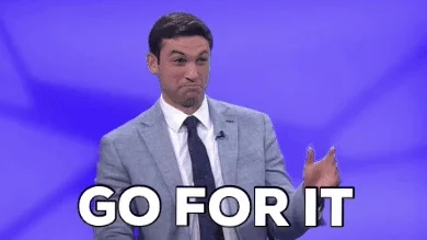A game show host points and says, 