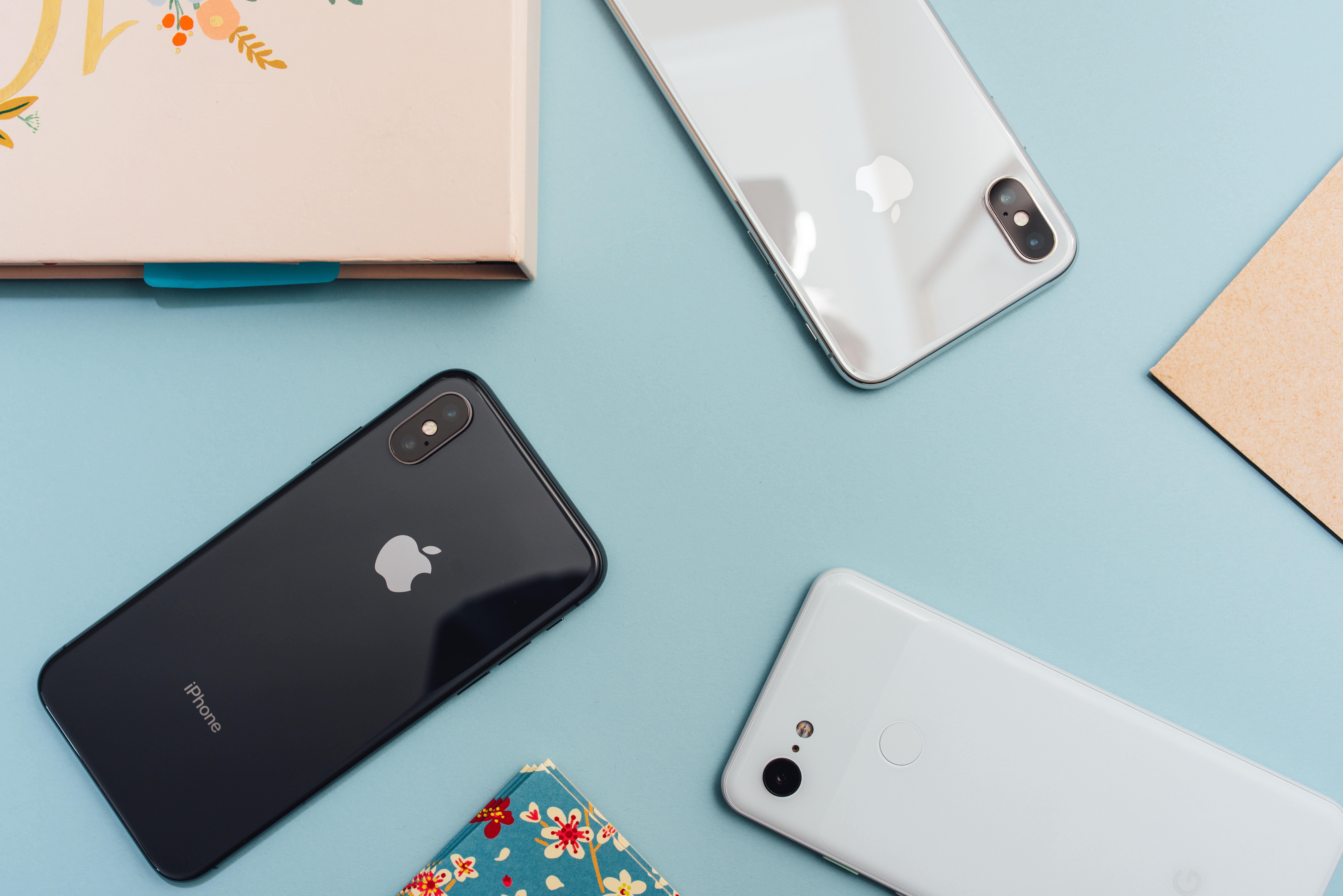 Assorted phones laid out on table