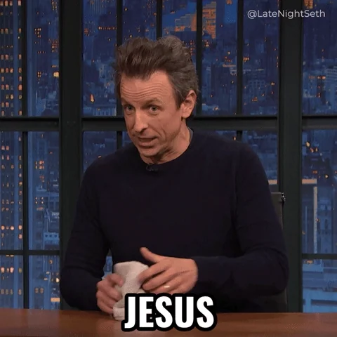 A man dabbing sweat from his forehead and saying, "JESUS". 