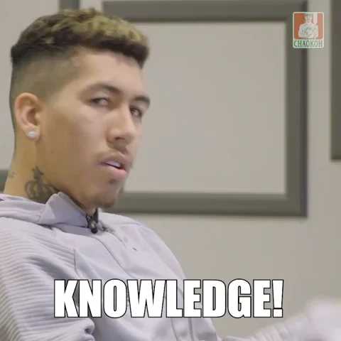 GIF of Brazilian soccer player, Robert 'Bobby' Firmino knowingly shaking his finger and head, with the word 'Knowledge'.