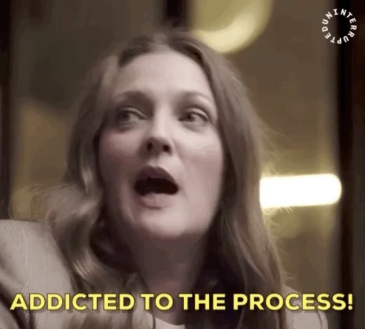Actress Drew Barrymore saying emphatically, "Addicted to the process!" 