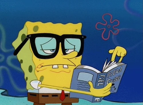Spongebob wears thick black glasses and turns the pages of a book titled 