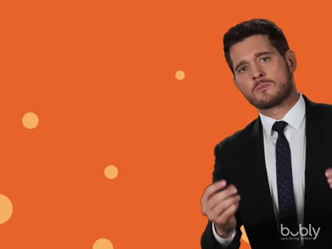 Michael Buble pointing and saying, 