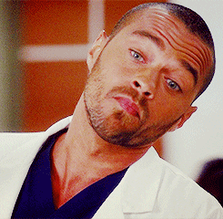 A doctor making an impressed facial expression.