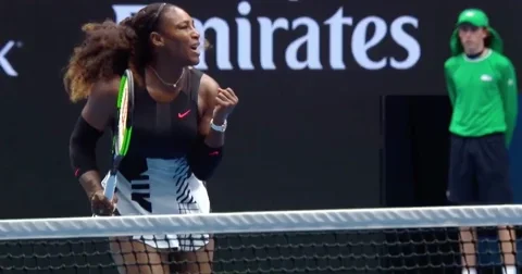 Serena Williams fist pumping when scoring a point