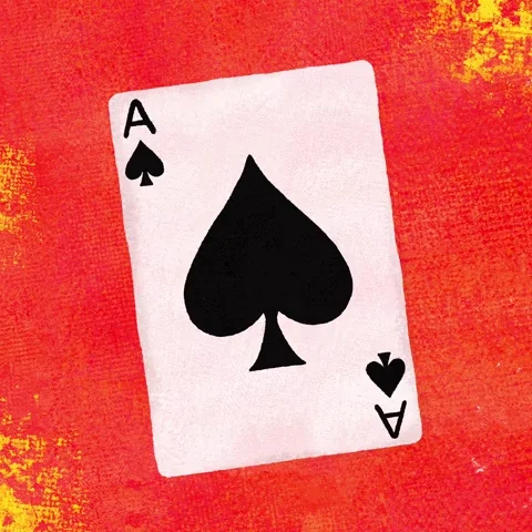 An ace of spades card on a flaming background.