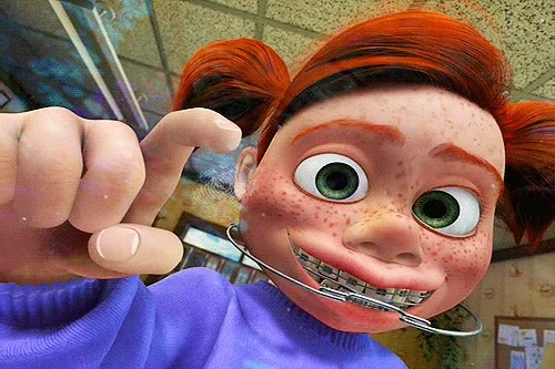 Animated girl with red pigtails, blue shirt, braces and large appliance on teeth, tapping the screen. 