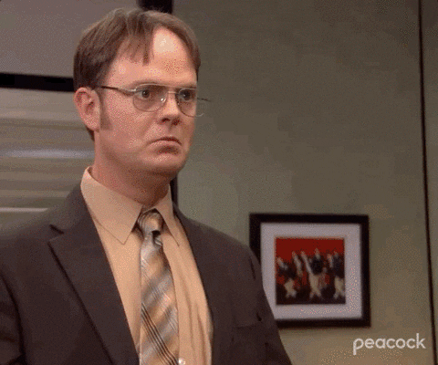 Dwight from the office saying, 'Yes! Yes! Yes!' while making wild gestures.