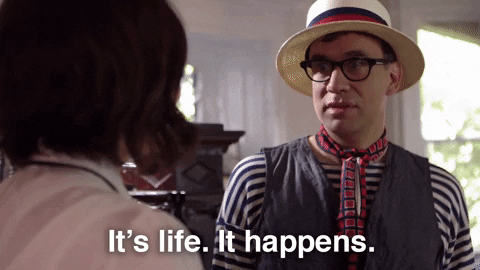 Gif of a man seriously telling another person, &apos;It's life. It happens.&apos;