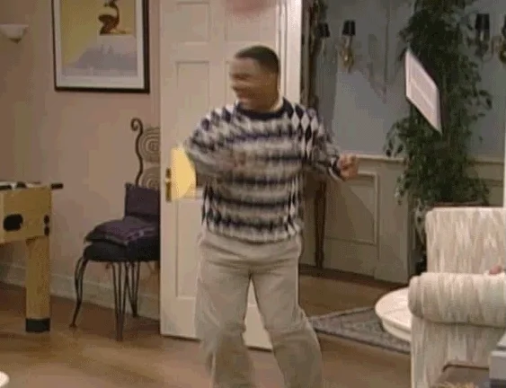 Carlton from Fresh Prince of Bel Air dances around a living room and does a back flip.