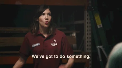 A woman pointing and saying, "We've got to do something."