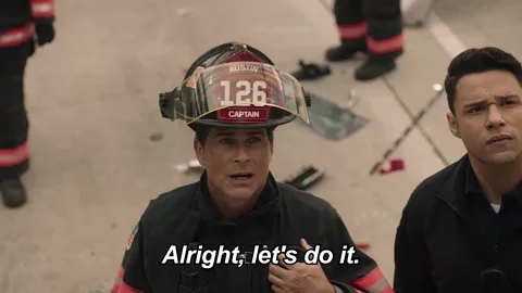 Afire captain saying, "Alright, let's do it."