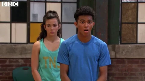 Two teens looking worried and surprised.