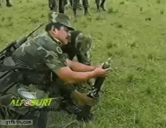 Two soldiers fail to operate a weapon.
