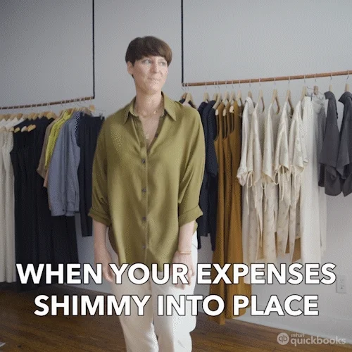 A woman shimming up and down with excitement because her expenses are in order.