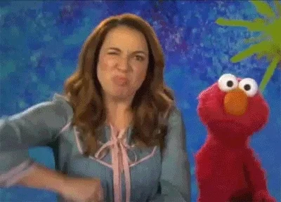 Woman and Elmo yell 'Brainstorm!'