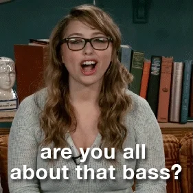 A girl in a classroom asks, 'Are you all about that bass?'