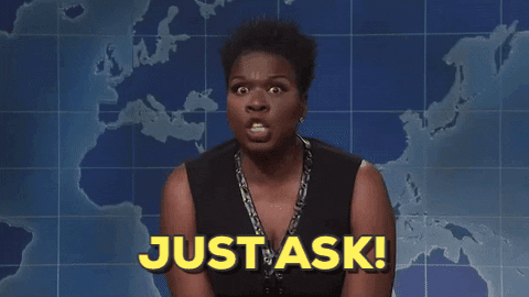 Leslie Jones saying just ask with yellow text