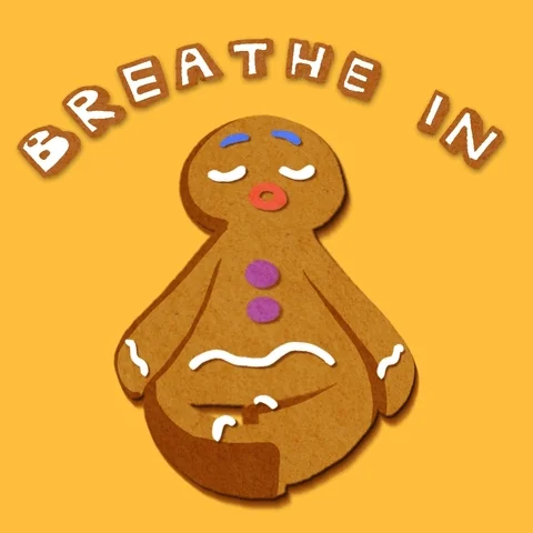 Gingerbread man inhaling and exhaling with text that says 