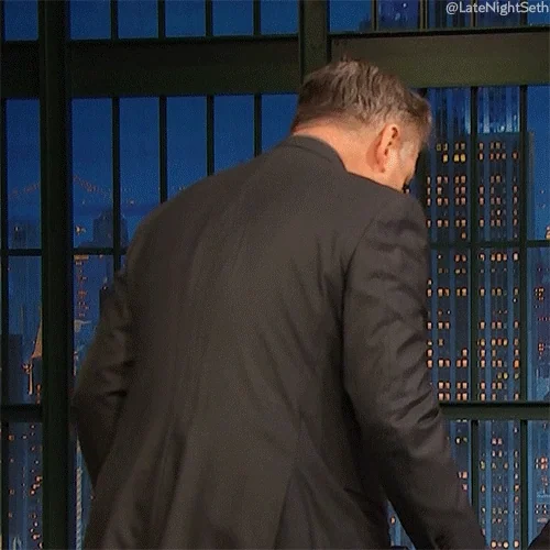 Alec Baldwin turns around and screams in panic.
