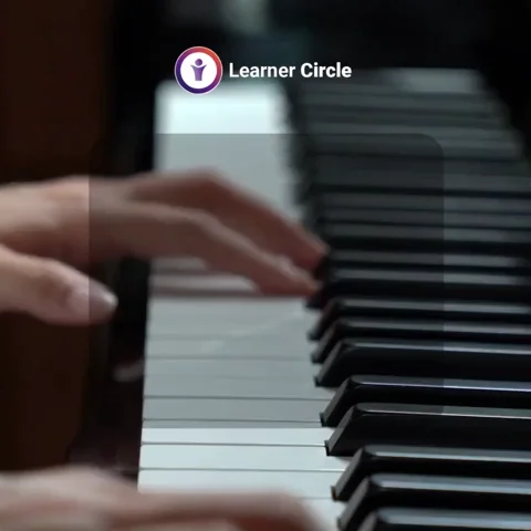 A person playing the piano and text that says, 