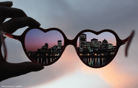 Sunglesses shaped like hearts, with photos of different countries flash in the lenses
