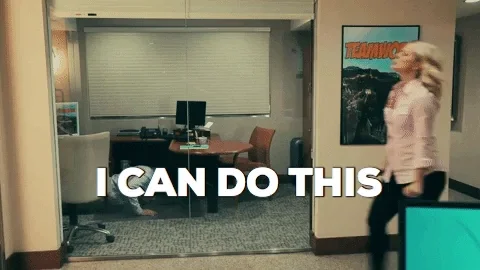 Woman quickly pacing in the office saying 'I can do this'